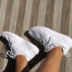 All white Nike shoes